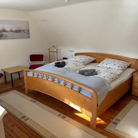 Dom wakacyjny Reetgedecktes Am Strandweg In *